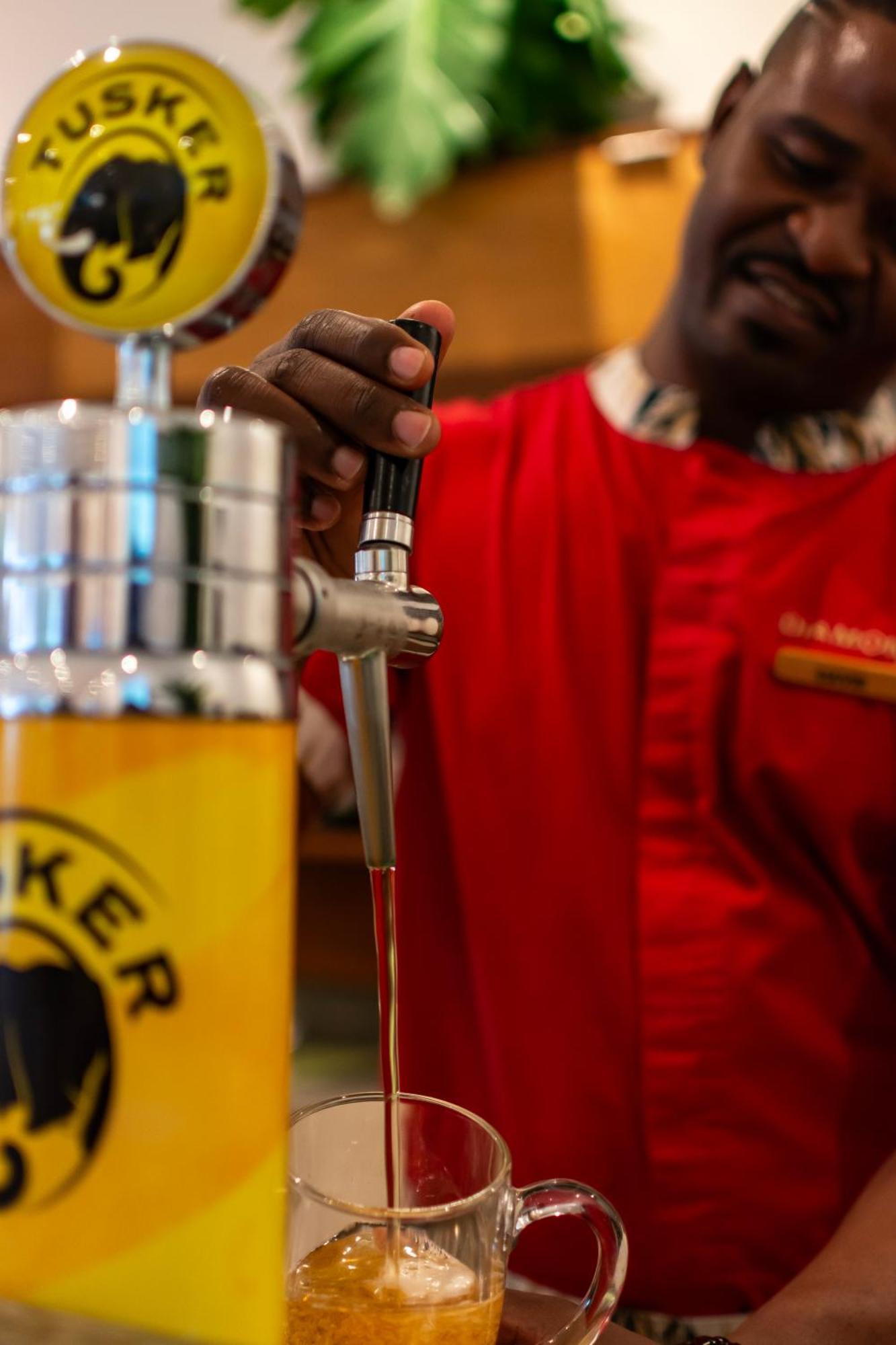 Diamonds Leisure Beach & Golf Resort Diani Beach Exterior foto A beer tap